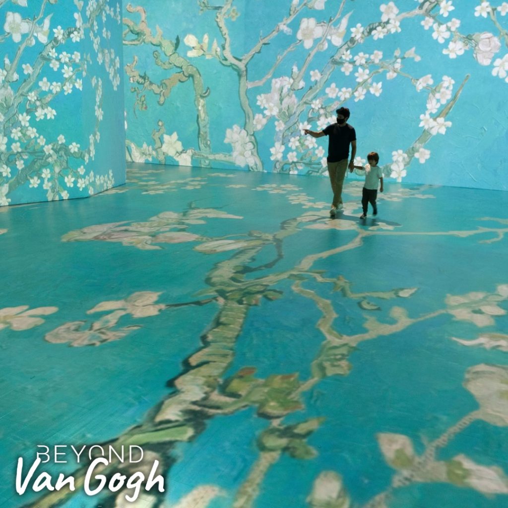 Beyond Van Gogh exhibit image - blossoming trees