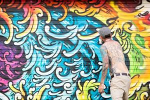 Pow Wow Hawaii Graffiti Mural by Marko Livingston, tattoo artist in Honolulu