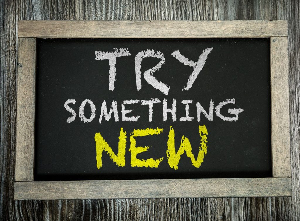 "Try something new" sign