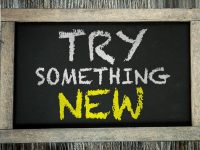 "Try something new" sign
