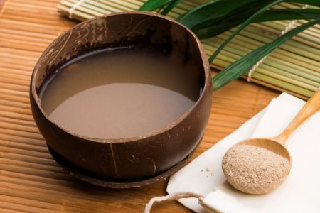 ʻawa (kava kave) beverage in a coconut shell cup